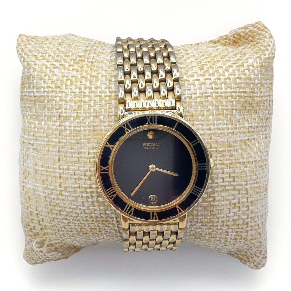 Seiko Ladies Vintage Gold Tone Black Dial & Roman Numerals Quartz Watch Size 7.5